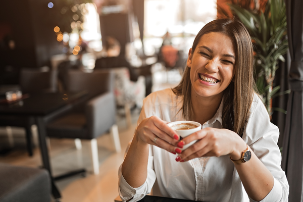 Happy lady at coffee