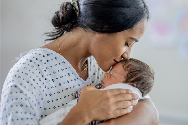 Mum and Genea baby embrace